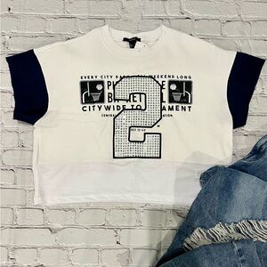 Cropped distressed sleeve tee